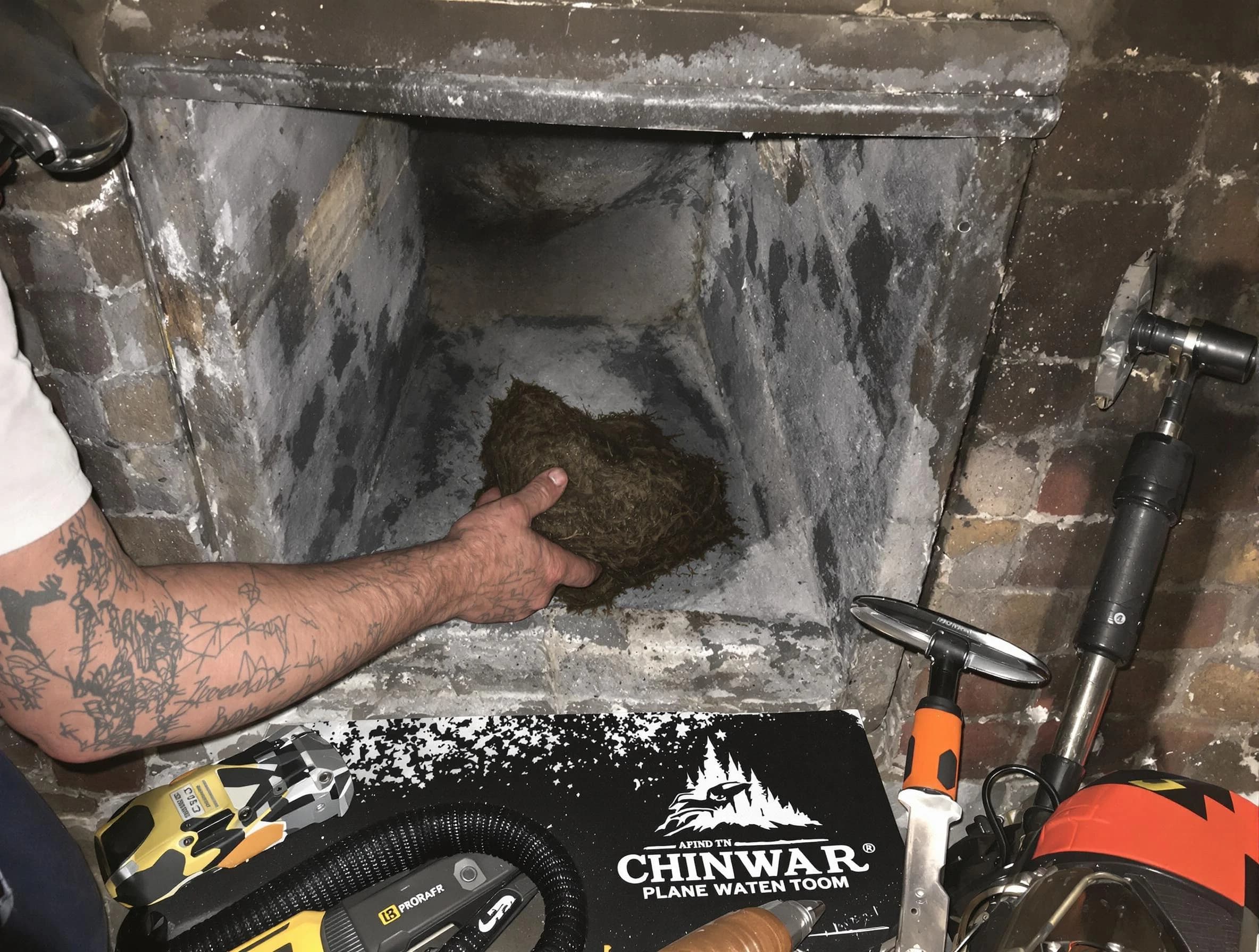 Linden Chimney Sweep safely removing debris and screening chimney in Linden, NJ